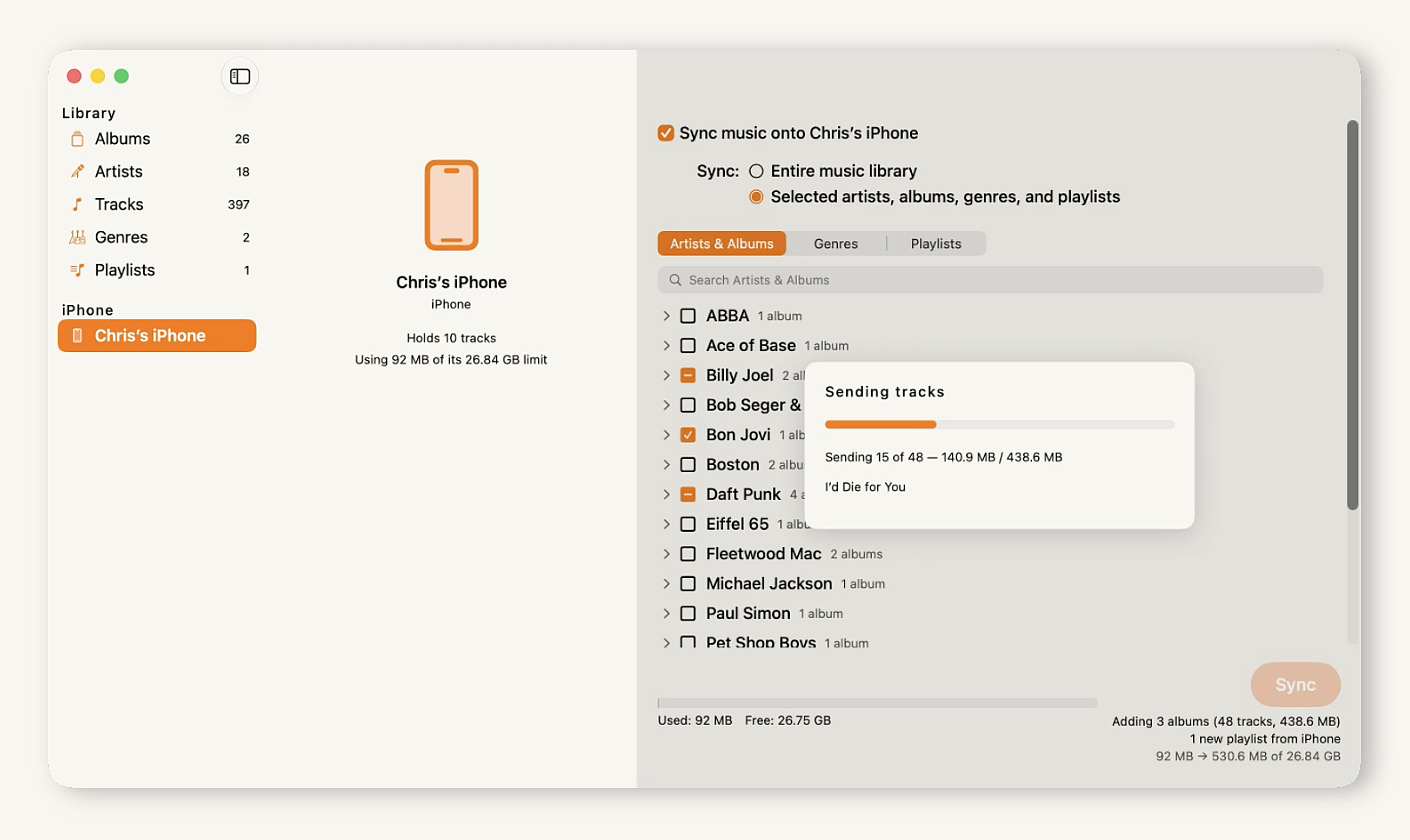 Streamless syncing to an iPhone over Wi-Fi — selection tree, transfer progress, and the staged-changes receipt